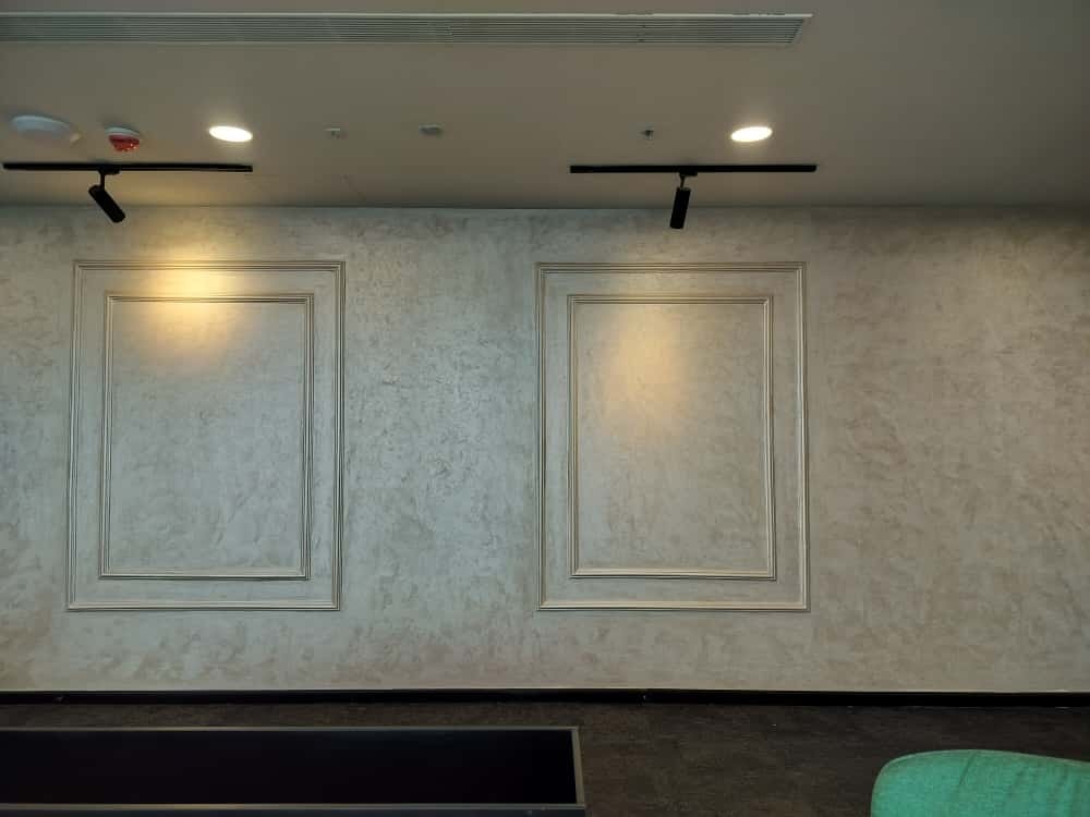 Manhattan Light framed wall panels with track lighting