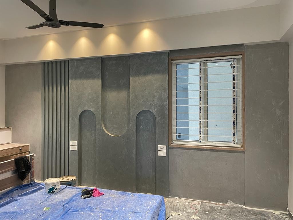Dark concrete wall with arch design